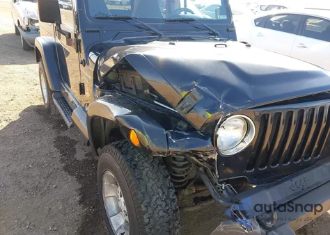2000 Jeep Wrangler Sahara из США, поврежденный, VIN 1J4FA59S5YP700778